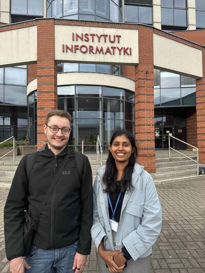 Koumudi and Johannes in front of the informatics institute in Wrocław