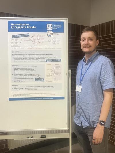 Johannes Schrott with his poster